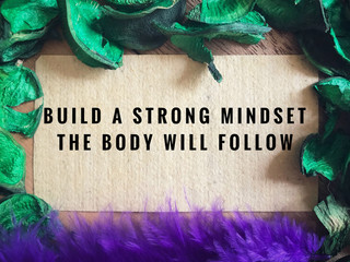 Wall Mural - Motivational and inspirational quotes - Build a strong mindset, the body will follow. With vintage styled background.