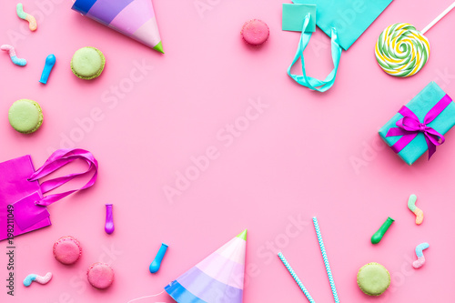 Download Birthday Party Accessories Party Hat Sweets Paper Bag For Gift On Pink Background Top View Copy Space Mockup Stock Photo Adobe Stock