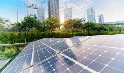 Wall Mural - solar panel plant with urban landscape landmarks,ecological energy renewable concept.