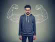 © pathdoc - confident strong man hipster on wall background