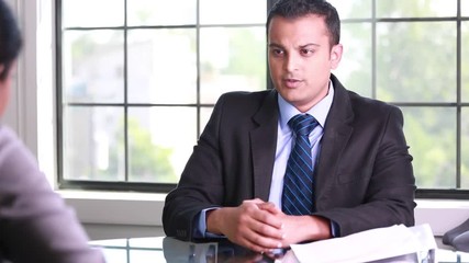 Wall Mural - Closeup portrait, guy in suit blazer and tie delivering breaking bad news to worker, isolated windows office background. Negative emotions facial expressions feelings