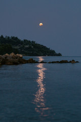 Wall Mural - Partial Lunar Eclipse 7/8 August 2017, peninsula Kassandra, Greece