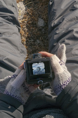 Wall Mural - look at the mountain scenery through the viewfinder of an old camera