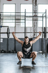 Wall Mural - Sportsman Lifting Weights