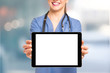 © Minerva Studio - Nurse showing a tablet screen