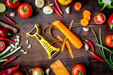 ingredients for vegetable ragout on wooden background top view