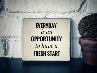Motivational and inspirational quotes - Everyday is an opportunity to have a fresh start. With vintage styled background.