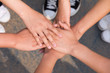 © Tinnakorn - People Hand Assemble Corporate Meeting Teamwork Concept.