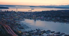 Amazing Sunset Helicopter Aerial Shot Seattle Washington USA Lake Union To Puget Sound Cinematic Panoramic View Skyline Architecture Coast Waterfront San Juan Islands Olympic Mountains View