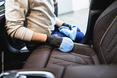 A Man Cleaning Car Interior Car Detailing Or Valeting