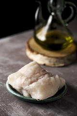 Wall Mural - raw codfish on a wooden table