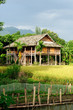 Wooden house on stilts in Asia in the Vietnamese village