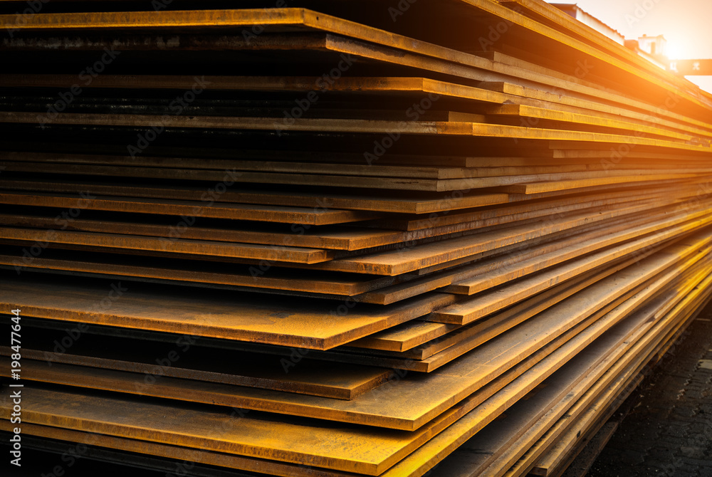 There is a lot of steel in the warehouse, at the cargo terminal   