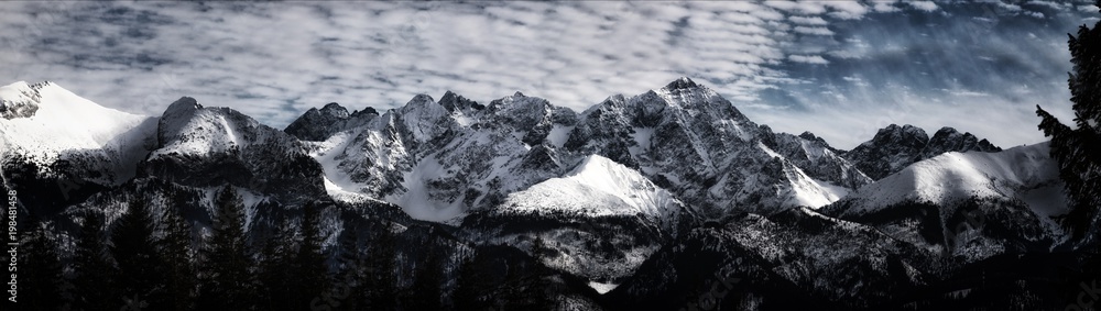 Snow-covered peaks of the Tatra Mountains. - obrazy, fototapety, plakaty 