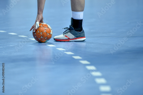 Fotografie, Obraz handball ball laying on the 9 meters dotted line on the pitch