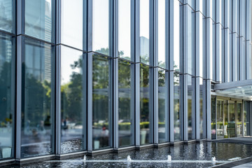 Wall Mural - The entrance of the modern Enterprise Building, in the face view of the blue tone.