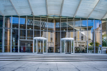 Wall Mural - The entrance of the modern Enterprise Building, in the face view of the blue tone.