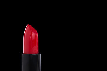 One lipstick tube on black isolated background.