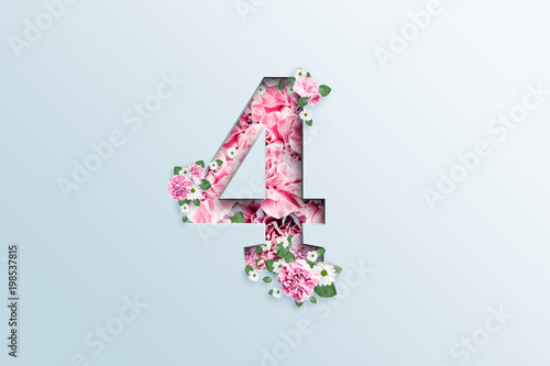 Cuadros en Lienzo A figure of four consisting of pink flowers and green leaves on a light background
