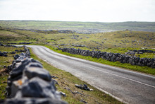 Long Road Pathway In Ireland Landscape
