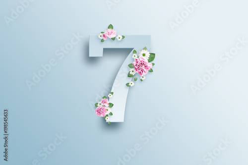 Fotografía Digit seven, pink roses and green leaves on a light background