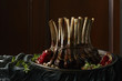© Andy Post - Rack of lamb with pomegranate on a plate with herbs and pistachios