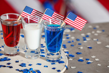 Wall Mural - Shots with American flags on table