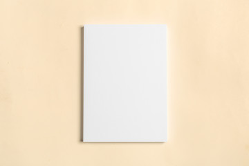 Canvas Print - White business card on wooden table. Blank portrait A4.