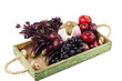 Set of different violet raw vegetables and fruits on the wooden tray