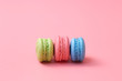 macaroons on pink background.