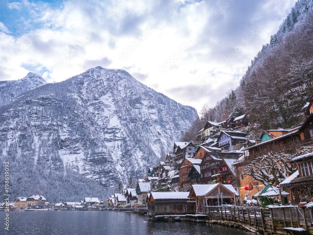 Alpine villages Hallstat in Austria One of the most beautiful winter season snow moutain colorful house	 - obrazy, fototapety, plakaty 