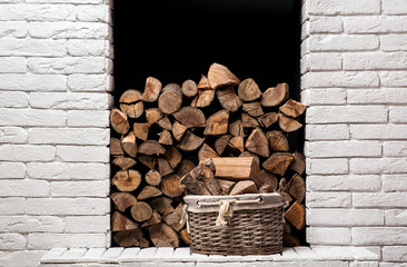 Log holder tray full of logs. Fireside storage.