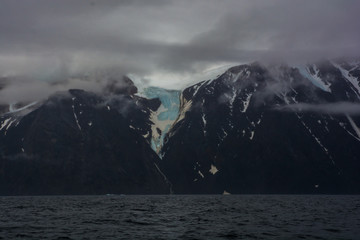 Wall Mural - glacier view in canada (nunavut). rock and ice. dramatic duet