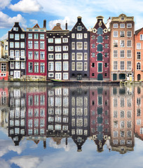 Wall Mural - Amsterdam architecture with reflection in Damrak canal, Netherlands