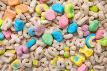 Frosted Toasted Oat Cereal With Fun Shaped Marshmallows On White Background.