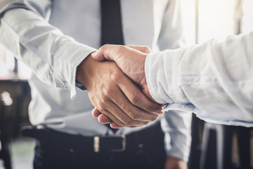 Aufkleber - Handshake after good cooperation, Two Businessman handshake after discussing good deal of Trading contract and new projects for the company of real estate, Meeting and greeting concept