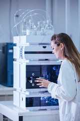 Wall Mural - scientist working with vials analysis in the laboratory