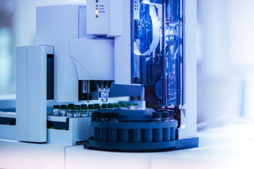 Wall Mural - equipment for vials analysis in a laboratory