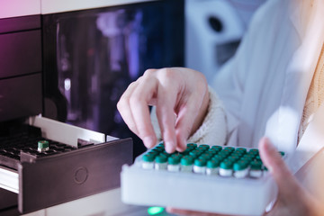 Wall Mural - scientist working with vials analysis in the laboratory