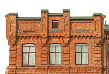 Facade Of The Three-storey Red Brick Building