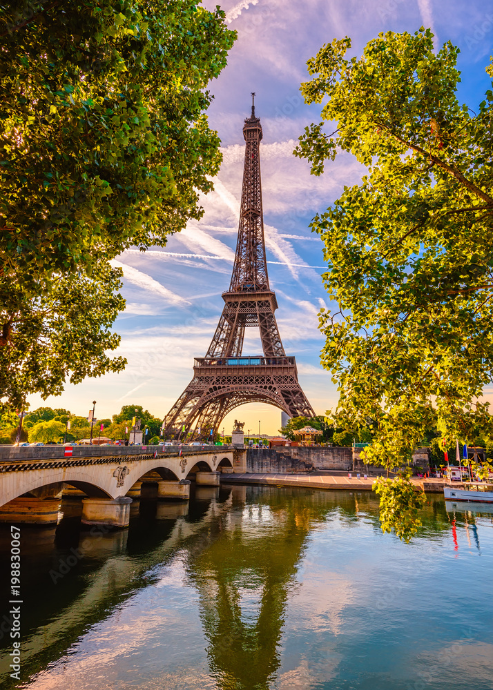 Paris Eiffel Tower and river Seine in Paris, France. Eiffel Tower is one of the most iconic landmarks of Paris - obrazy, fototapety, plakaty 