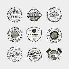 Wall Mural - set of sawmill logos. retro styled woodwork emblems. vector illustration