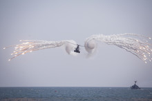 Romanian Navy Helicopter Launches Decoy Flares (missile Defense System) During The Romanian Navy Day