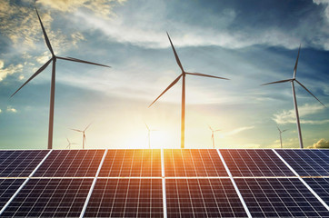 Wall Mural - solar panels with wind turbines and sunset. concept clean energy in nature