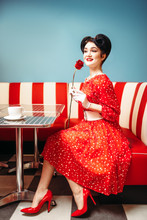 Sexy Pin Up Woman With Make-up Holds Red Rose