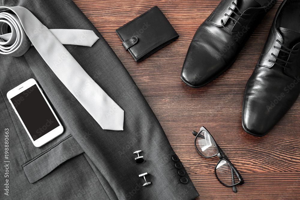 Composition with stylish men's  shoes on wooden background