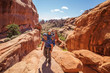 © Maygutyak - A family with baby son visits Arches National Park in Utah, USA