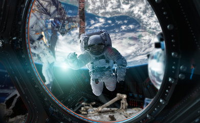Leinwandbilder - Astronaut working on a space station 3D rendering elements of this image furnished by NASA