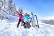 © Africa Studio - Friends at snowy ski resort. Winter vacation