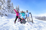 Friends at snowy ski resort. Winter vacation